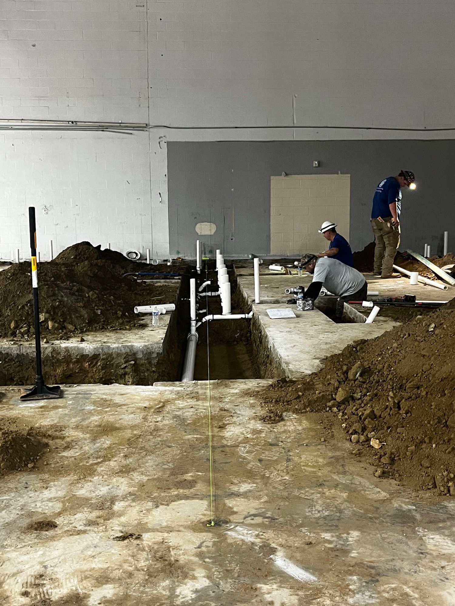 A group of men are working on a construction site.
