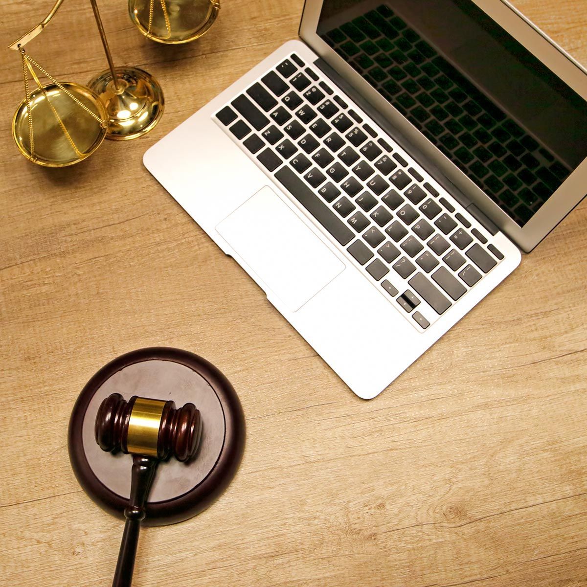 Justice Scale, Gavel, and Laptop on Table — Elko, NV — David D. Loreman, CHTD. Justice Scale, Gavel, and Laptop on Table — Elko, NV — David D. Loreman, CHTD.