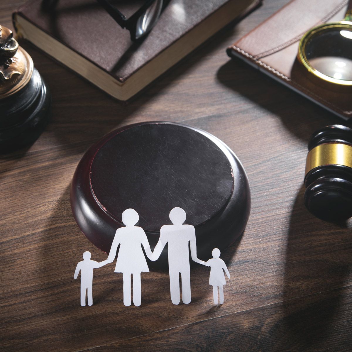 Paper Cut Out of a Family on Lawyer's Table — Elko, NV — David D. Loreman, CHTD. Paper Cut Out of a Family on Lawyer's Table — Elko, NV — David D. Loreman, CHTD.