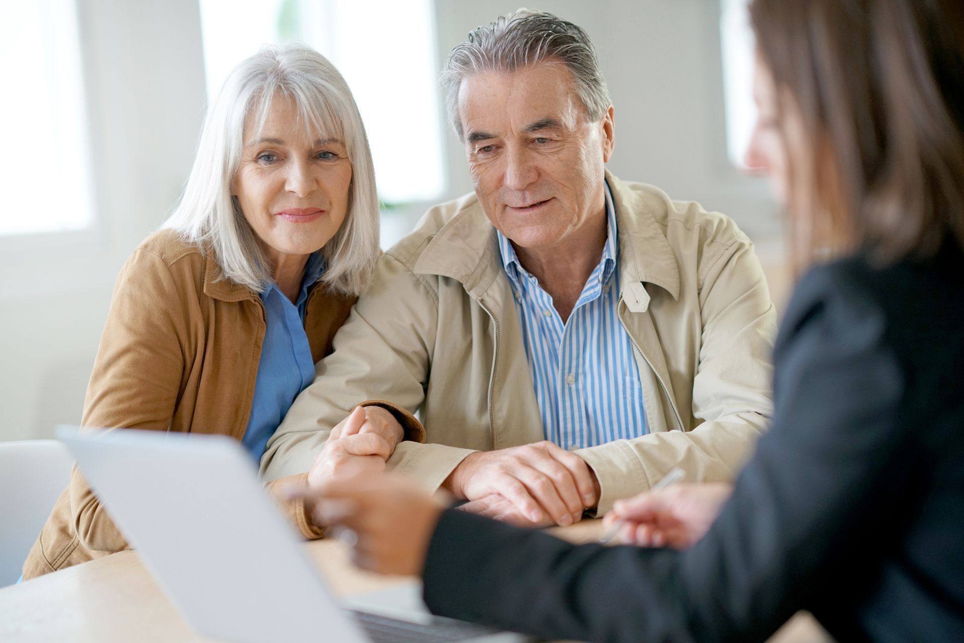 Senior couple asking questions about independent living.