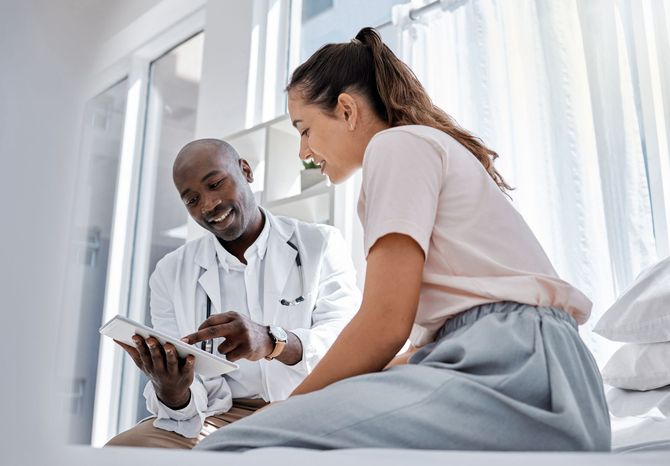 doctor+with+female+patient+mace+avenue+medical