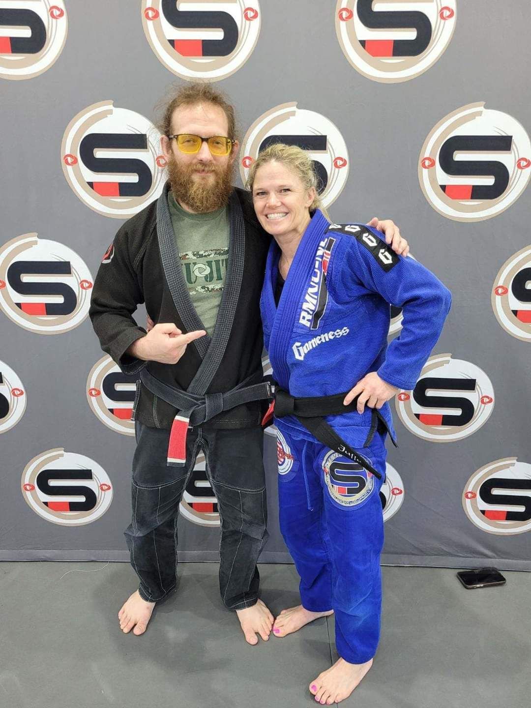 Adults drilling Brazilian Jiu-Jitsu technique at Rip Tide Brazilian Jiu Jitsu in Lewes, DE.