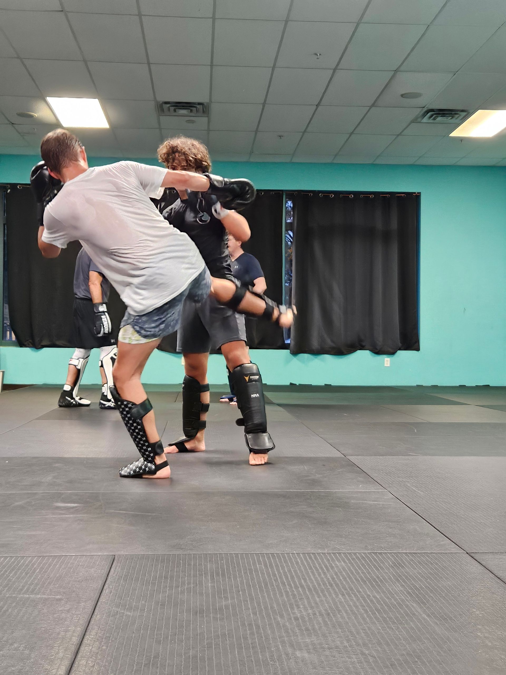 Adults drilling Brazilian Jiu-Jitsu at Rip Tide Brazilian Jiu Jitsu in Lewes, DE to build confidence