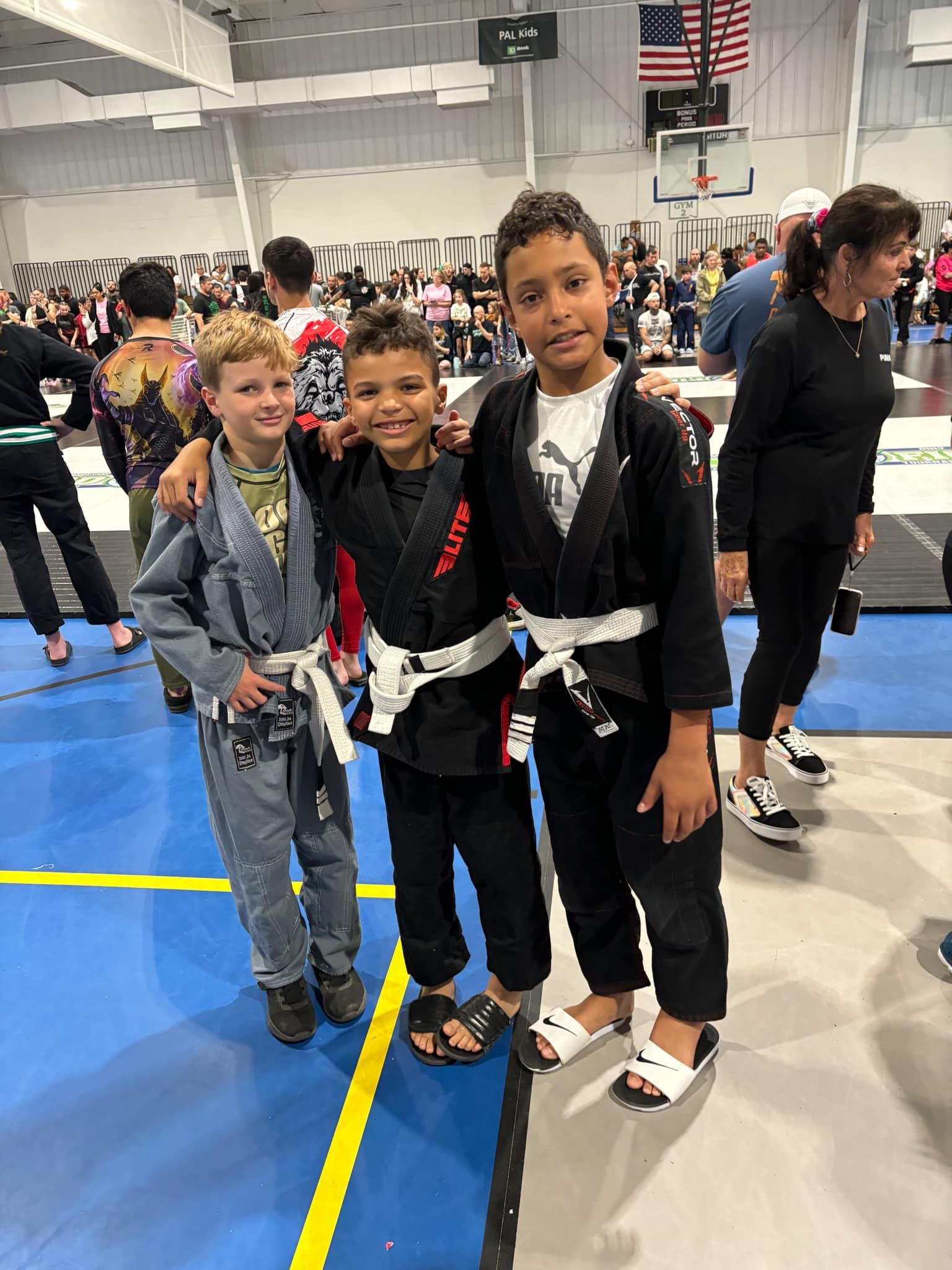 Kids practicing grappling drills at Rip Tide Brazilian Jiu Jitsu in Lewes, DE to build confidence.