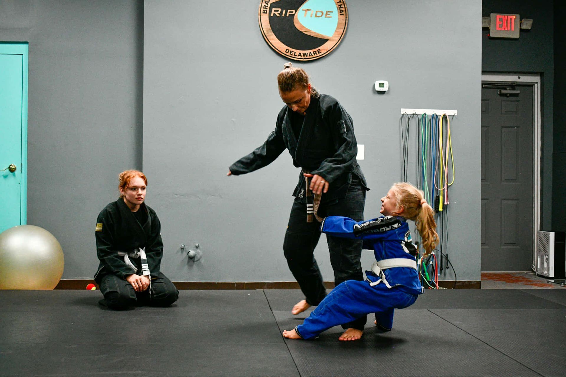 Kids practicing safe grappling drills at Rip Tide Brazilian Jiu Jitsu in Lewes, DE.