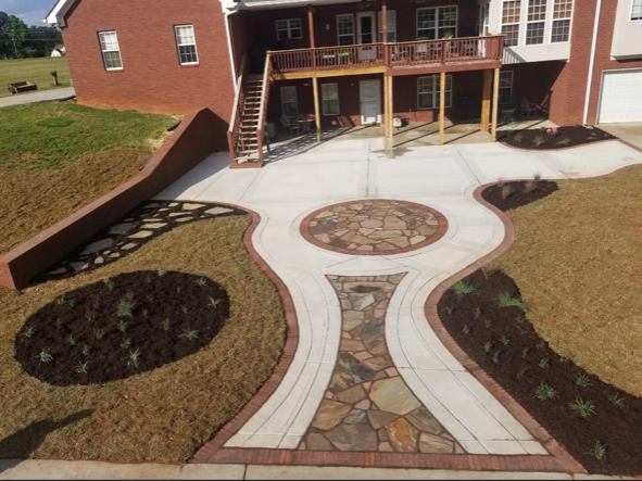 A brick house with a circular walkway in front of it