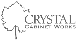 Logo for Crystal Cabinet Works: leaf outline, text 