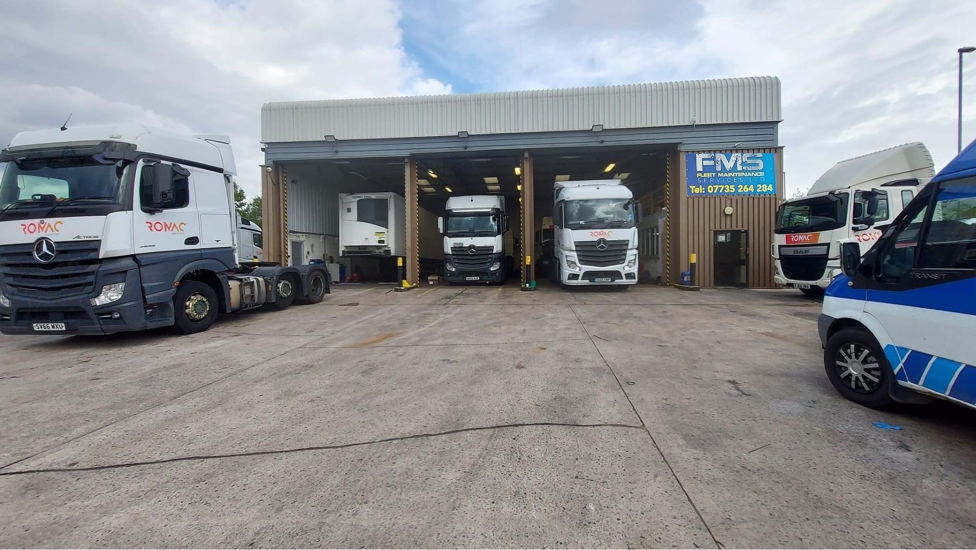 The three FMS vehicles facing the viewer.