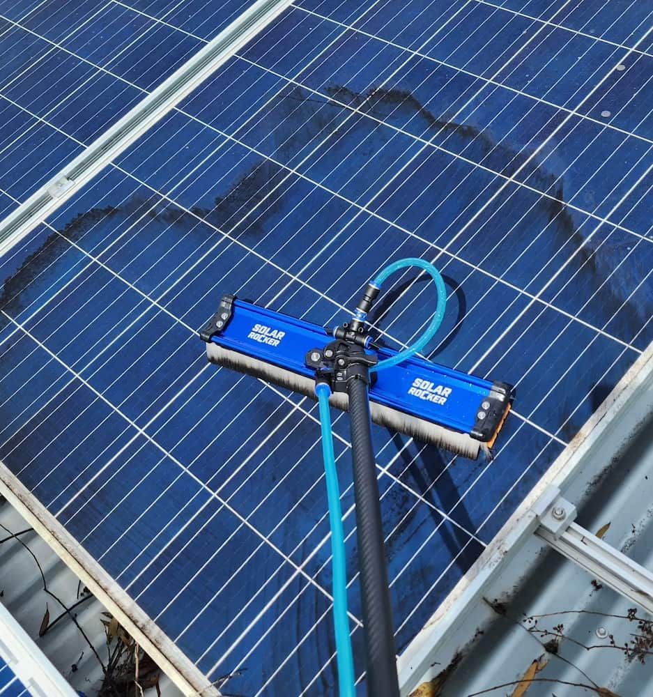 Solar Panel Cleaning Tool, Blue Brush, Black Pole, on Solar Panels — Rapid Rinse Solutions in Shepparton, VIC