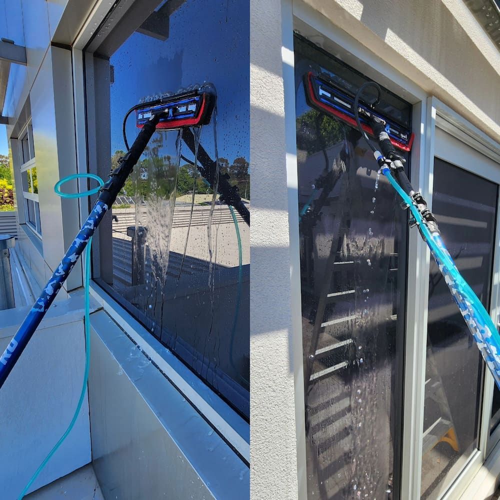 Window Cleaner Washes a Window— Rapid Rinse Solutions in Shepparton, VIC