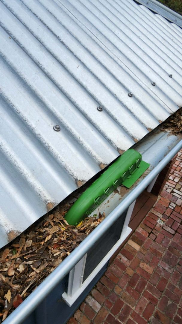 Gutter Cleaning With a Black Tube — Rapid Rinse Solutions in Shepparton, VIC