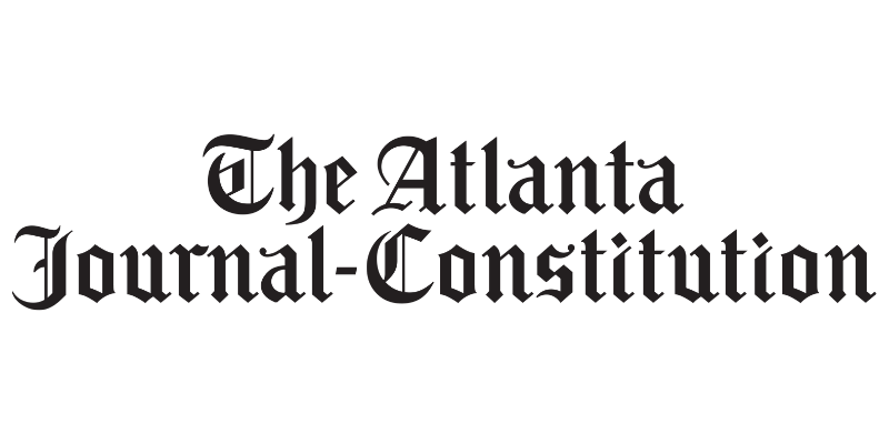 The Atlanta Journal-Constitution logo in black gothic font.