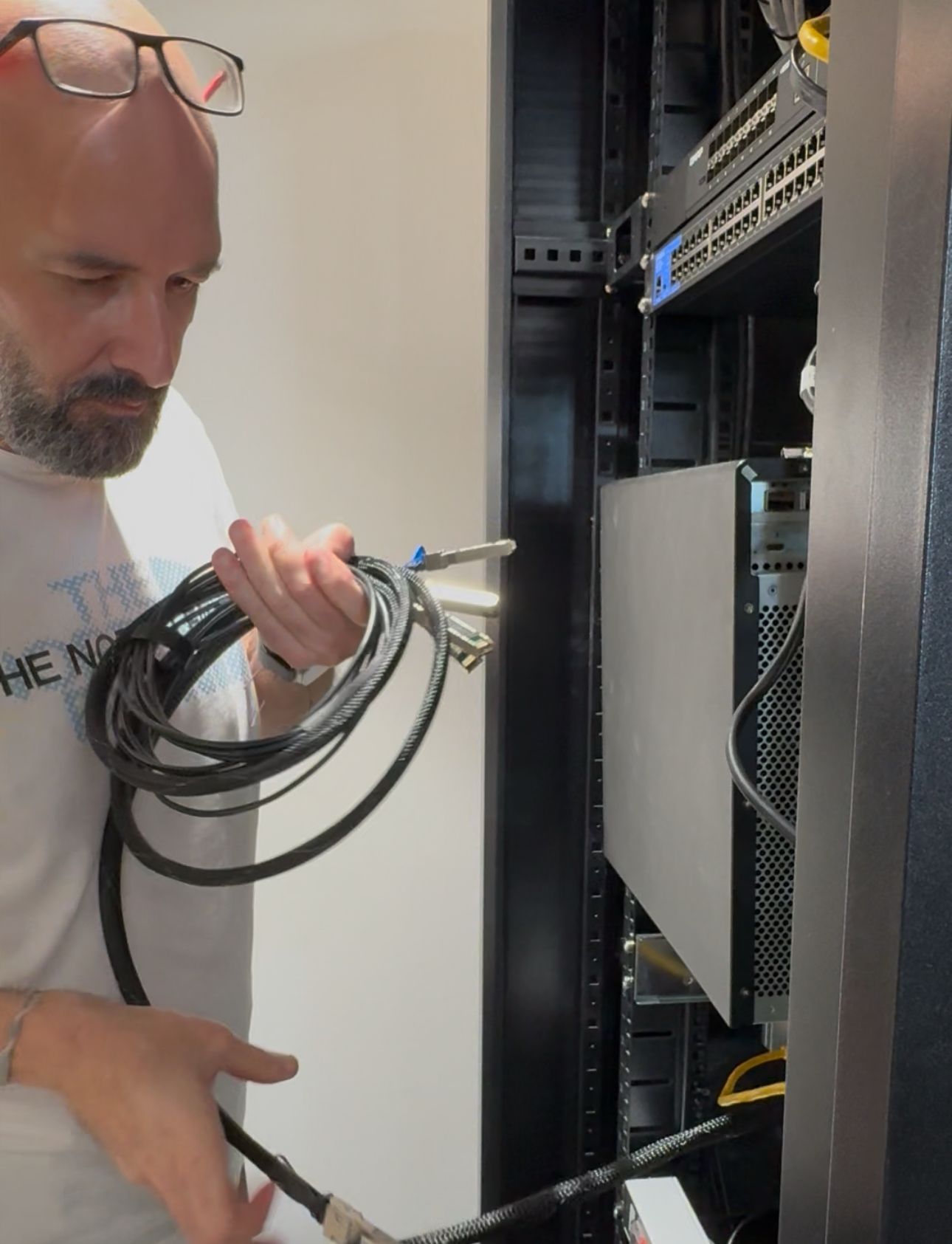 Fadi Helou performing structured network cabinet installation and cabling in Dubai for enterprise infrastructure systems