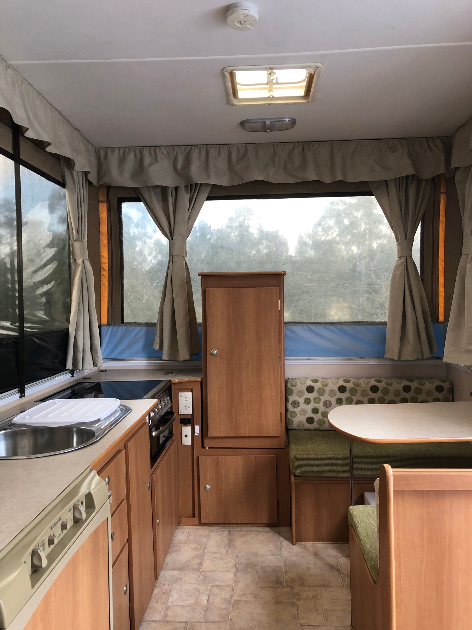 Interior of a Pop-up Camper With a Kitchen Area — Great Lakes Caravans & RV P/L In Newcastle, NSW