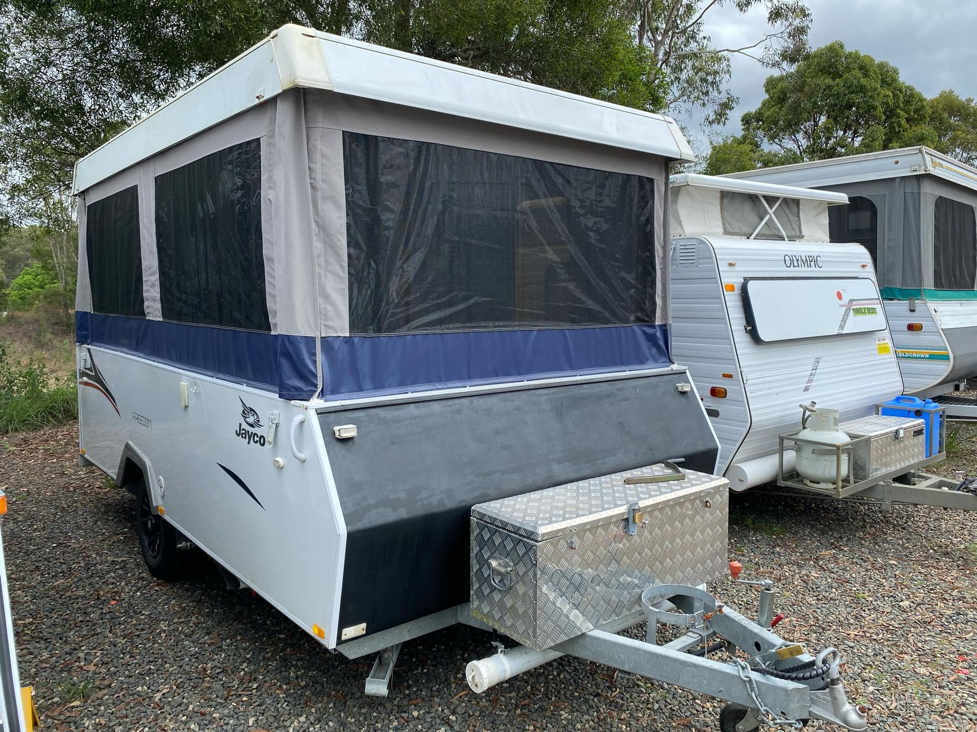 White and Blue Pop-up Camper Trailer With Black Trim — Great Lakes Caravans & RV P/L In Maitland, NSW