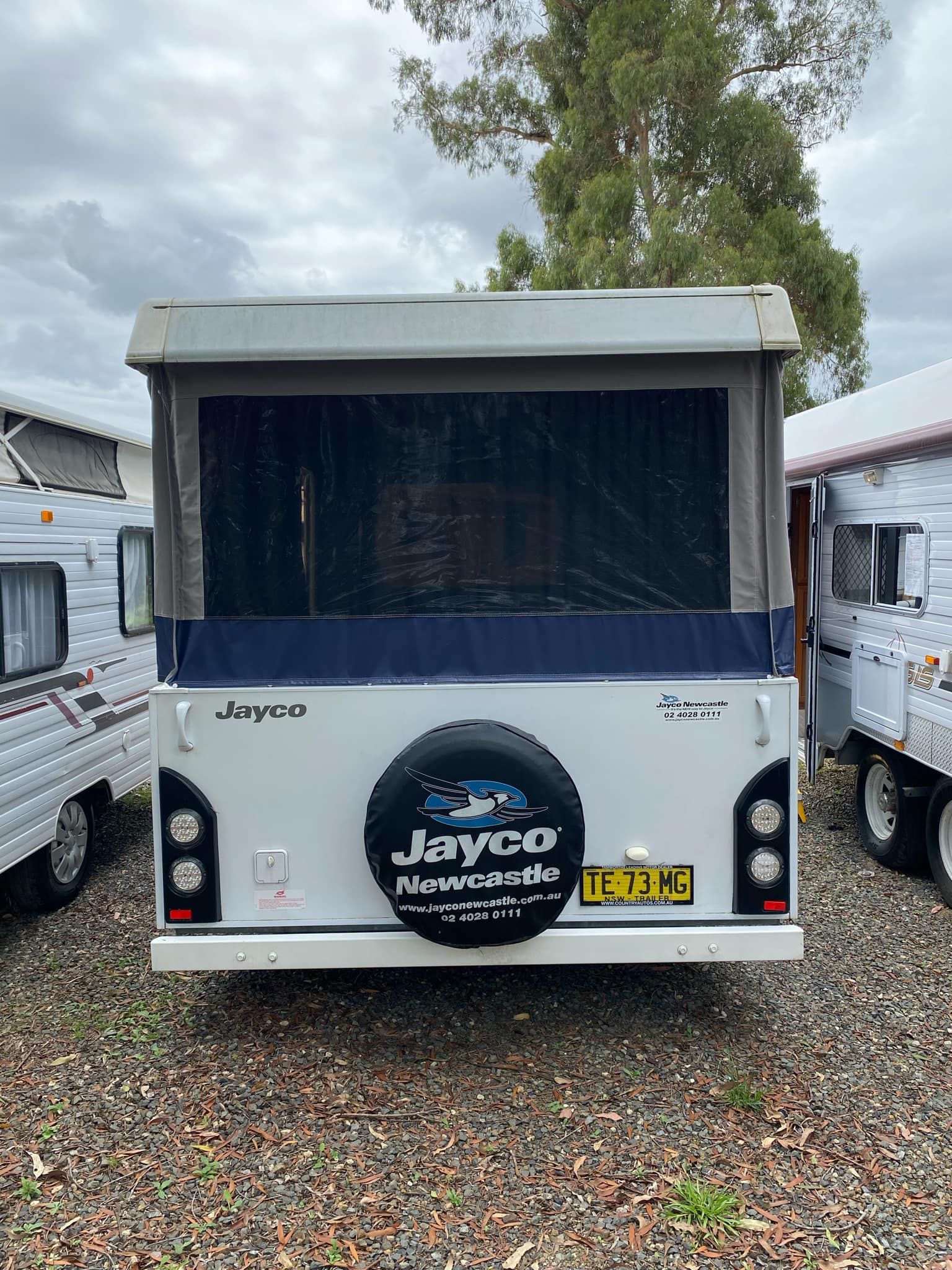 White Jayco Camper Trailer With Spare Tire — Great Lakes Caravans & RV P/L In Port Macquarie, NSW
