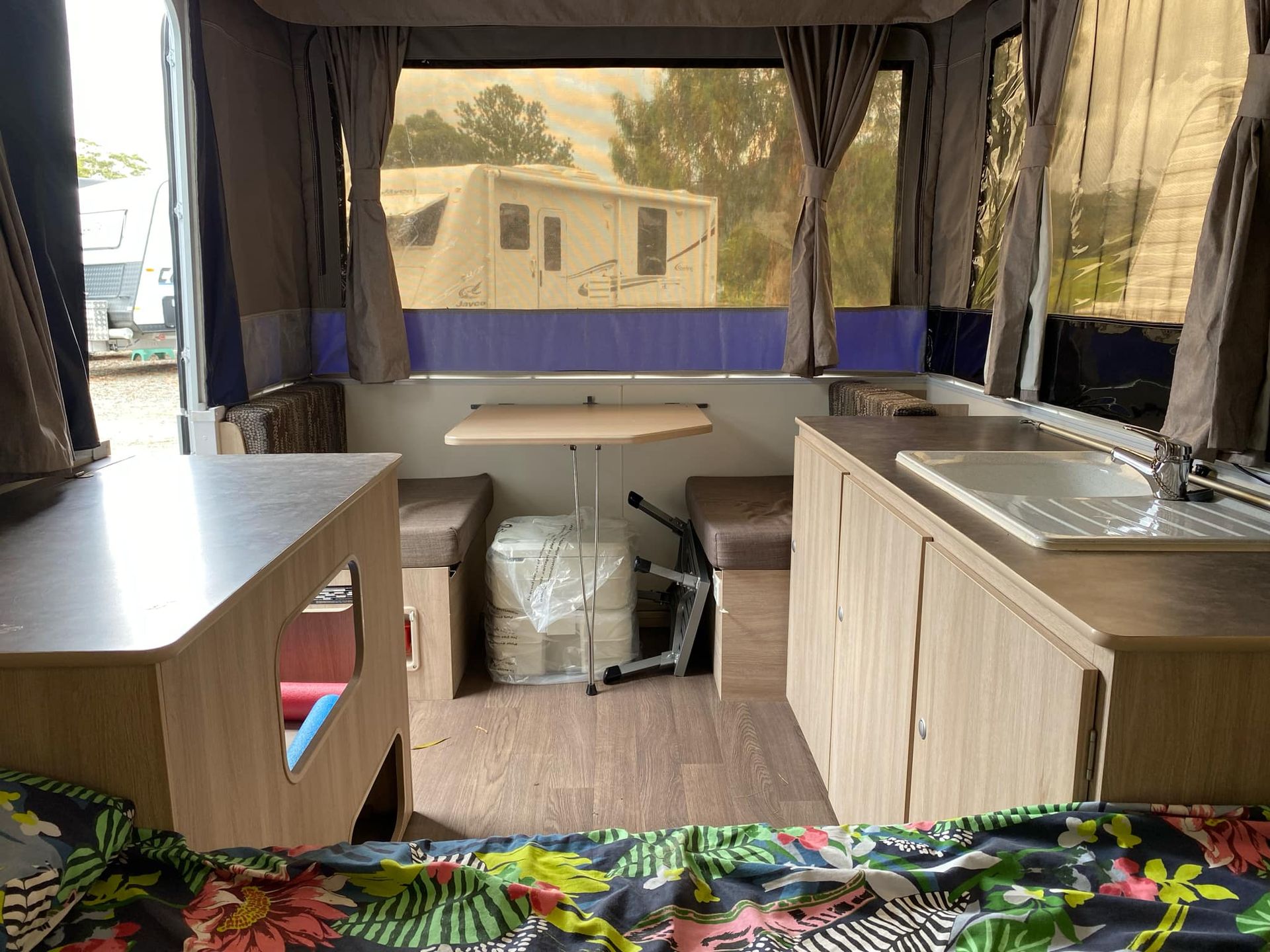 Pop-up Camper Featuring Table and Cabinets — Great Lakes Caravans & RV P/L In Taree, NSW