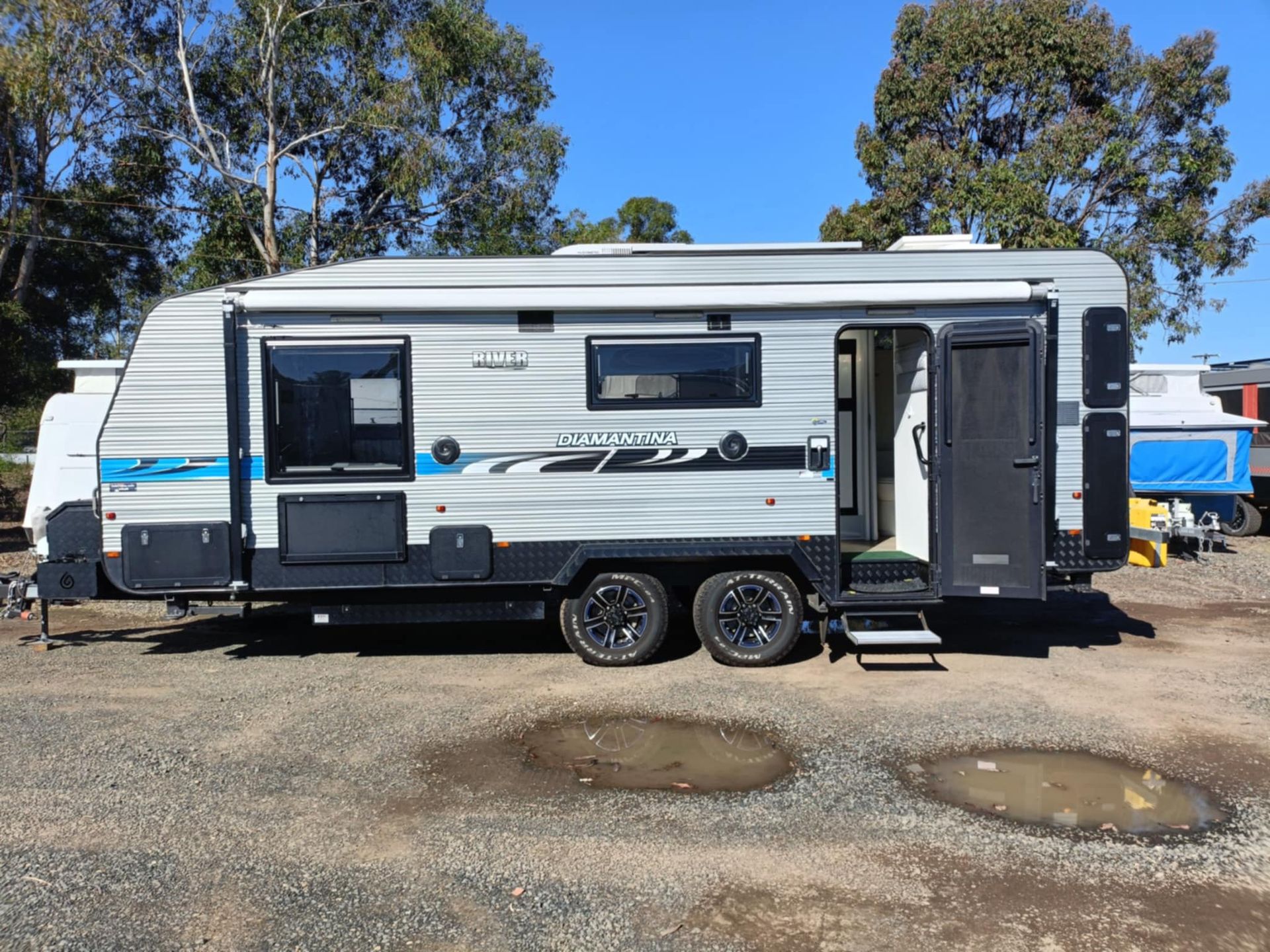 Grey and Black Caravan Parked Outdoors — Great Lakes Caravans & RV P/L In Port Macquarie, NSW