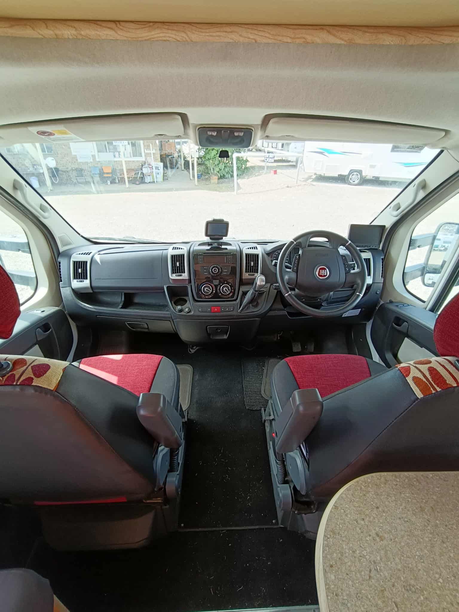 Interior of a Campervan, Showing  Driver and Passenger Seats — Great Lakes Caravans & RV P/L In Taree, NSW