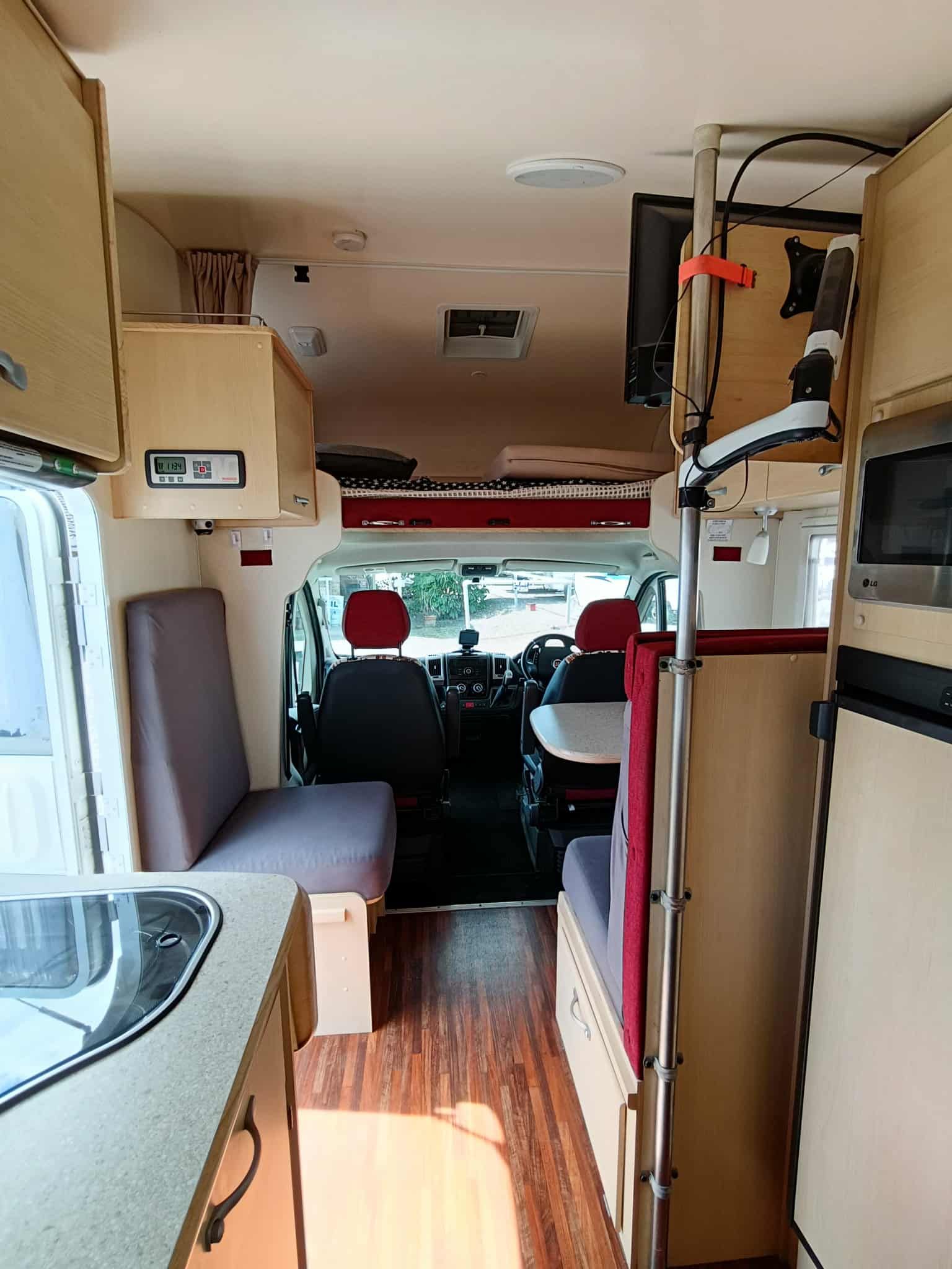 Interior of a Camper Van With Wood Flooring — Great Lakes Caravans & RV P/L In Maitland, NSW