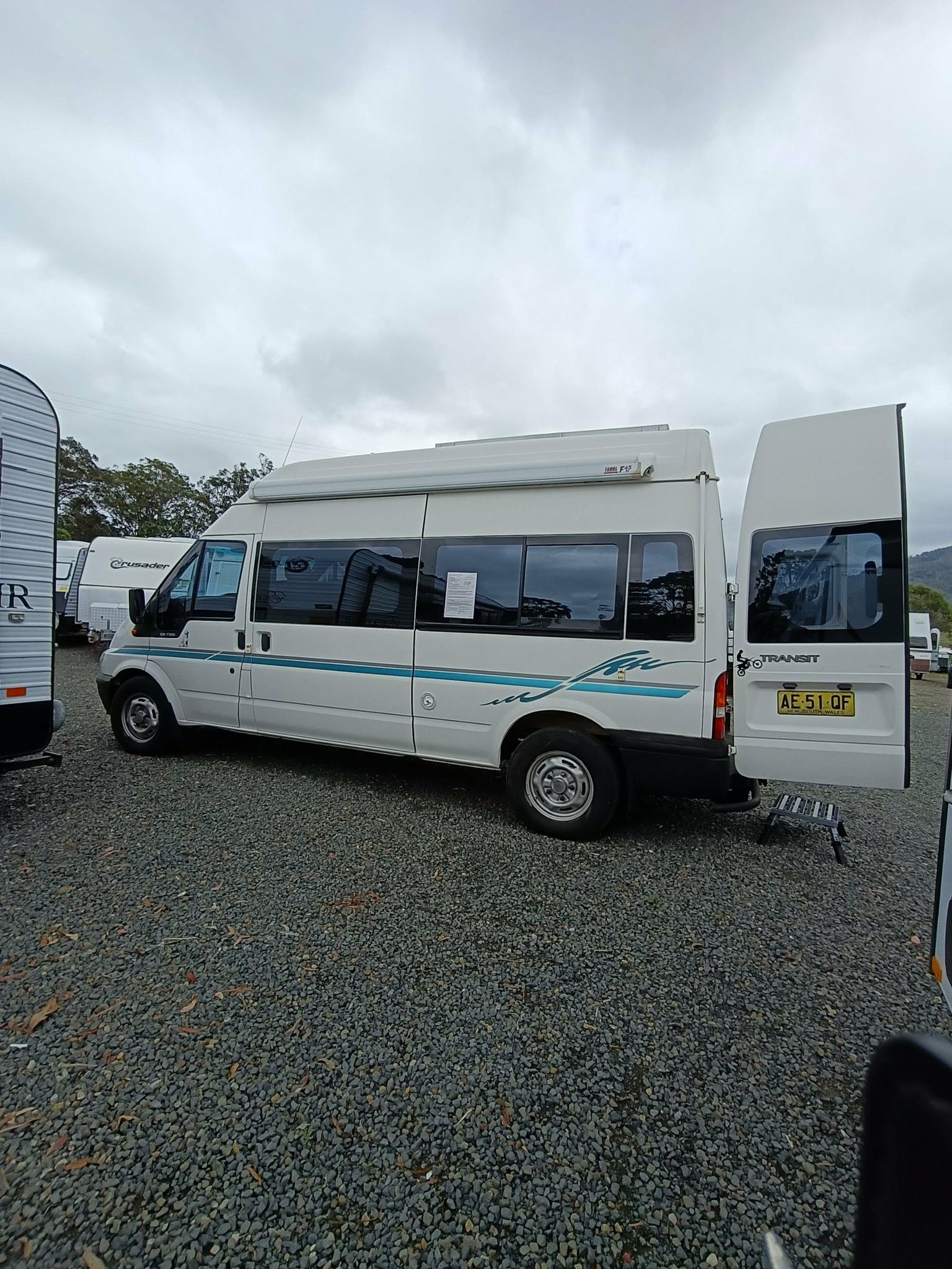 White Camper Van With Rear Door Open — Great Lakes Caravans & RV P/L In Forster, NSW