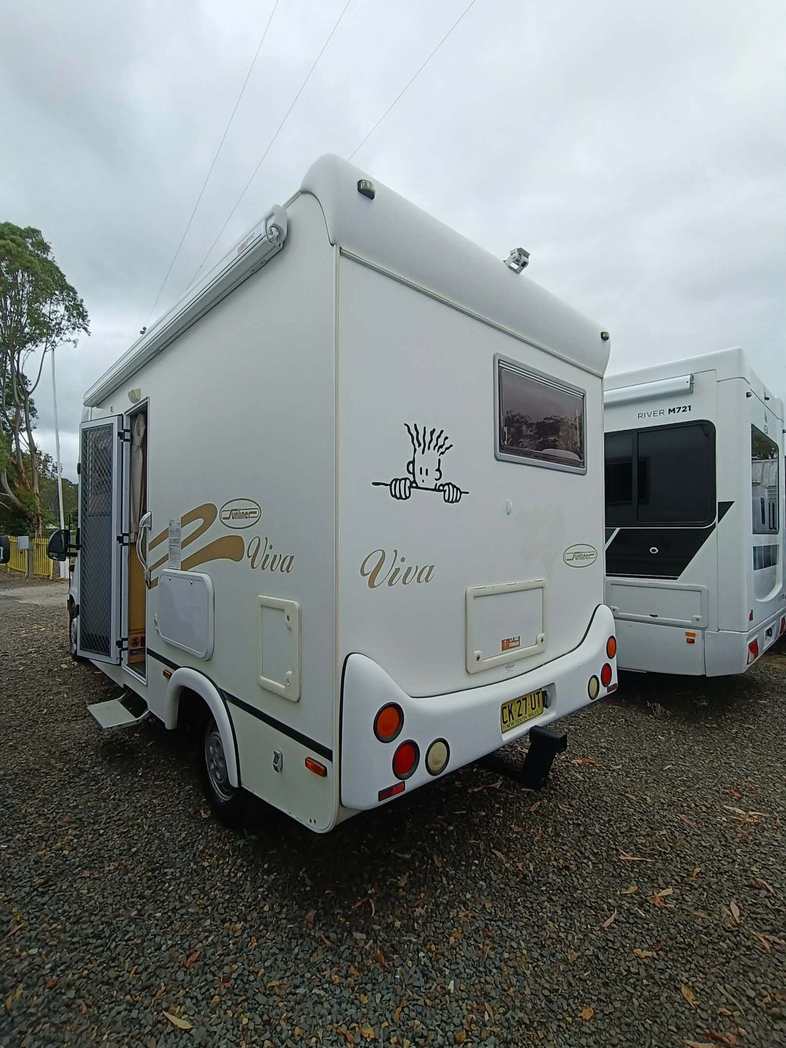 White Campervan With Open Door — Great Lakes Caravans & RV P/L In Maitland, NSW