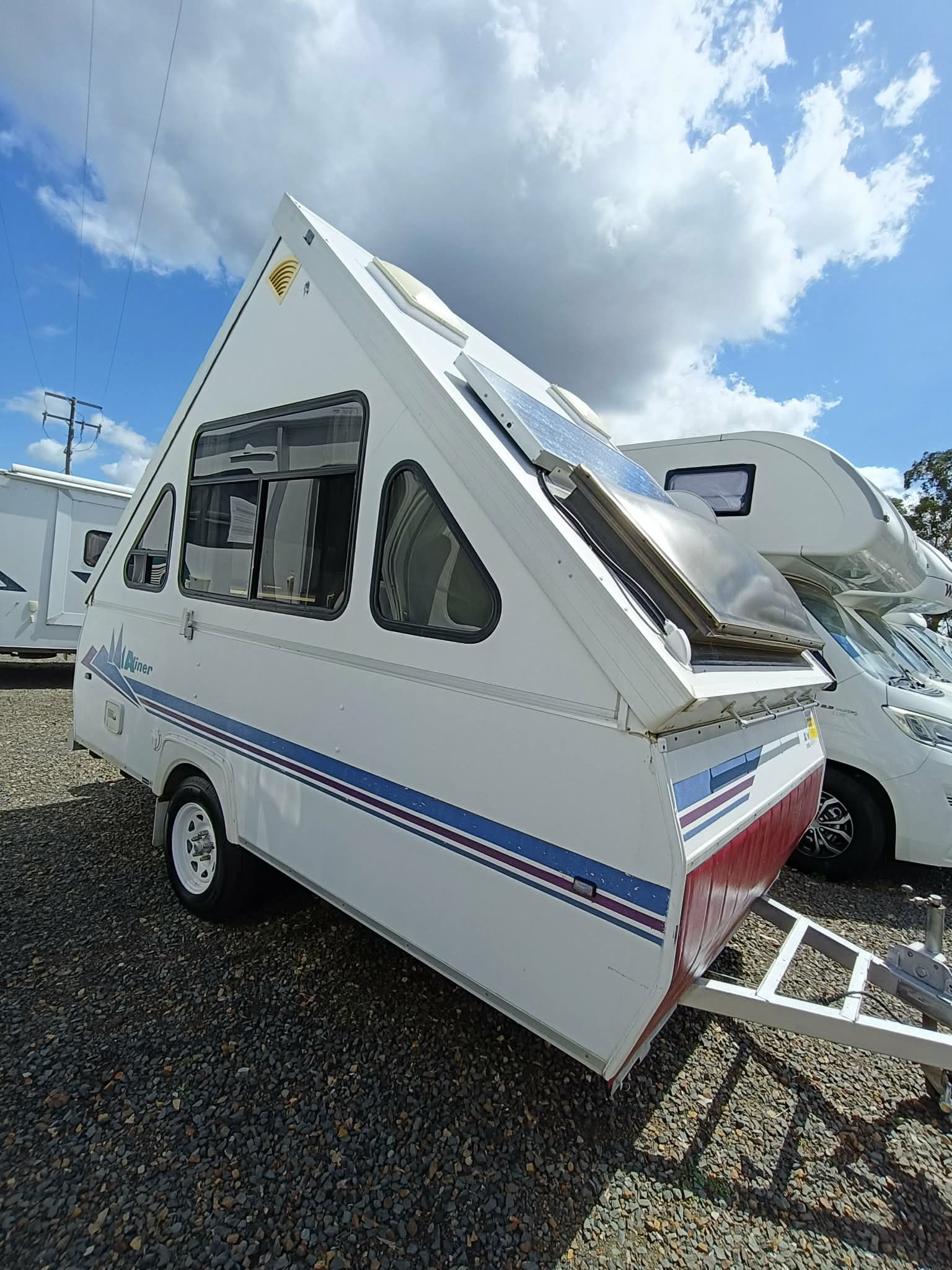 White A-frame Camper Trailer With Blue Stripes — Great Lakes Caravans & RV P/L In Forster, NSW