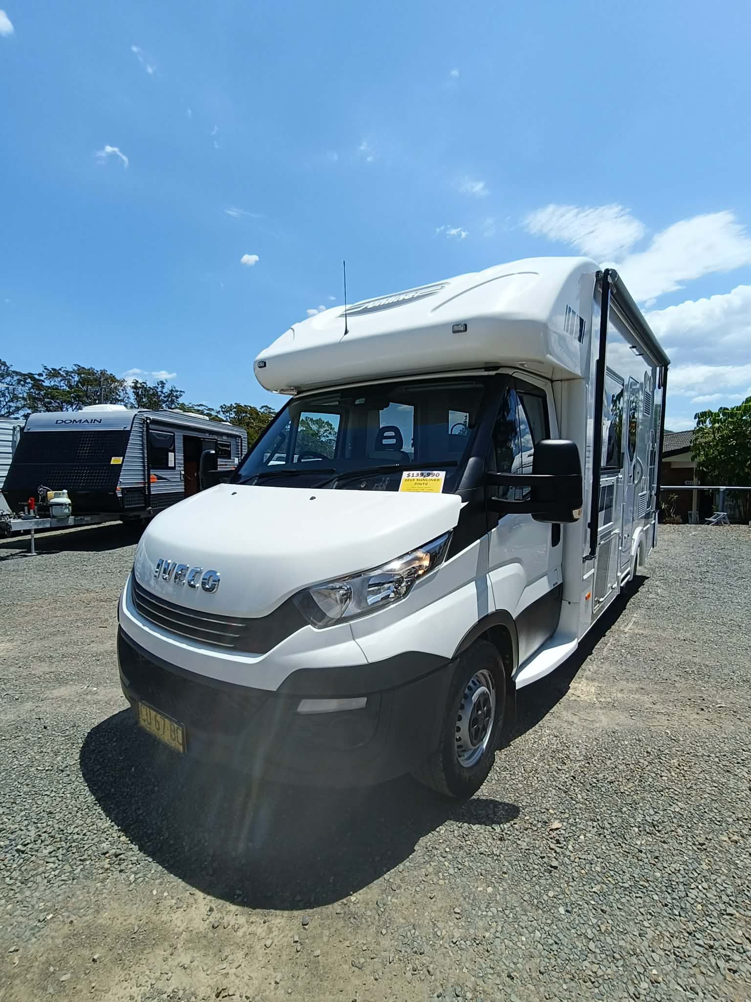 White Recreational Vehicle Parked on Gravel — Great Lakes Caravans & RV P/L In Nabiac, NSW
