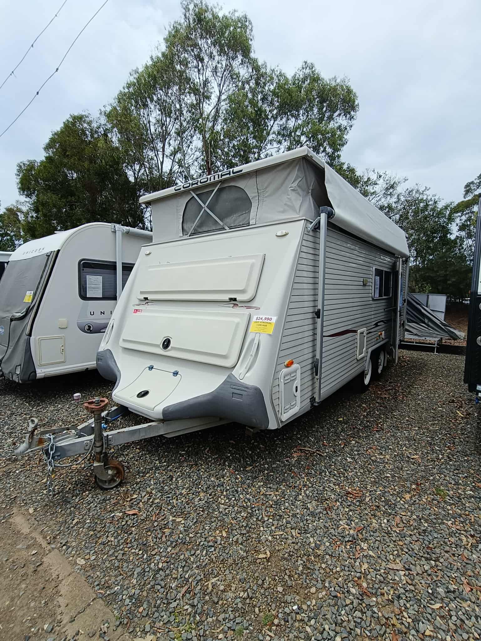 Grey Pop-top Caravan Parked on Gravel — Great Lakes Caravans & RV P/L In Nabiac, NSW