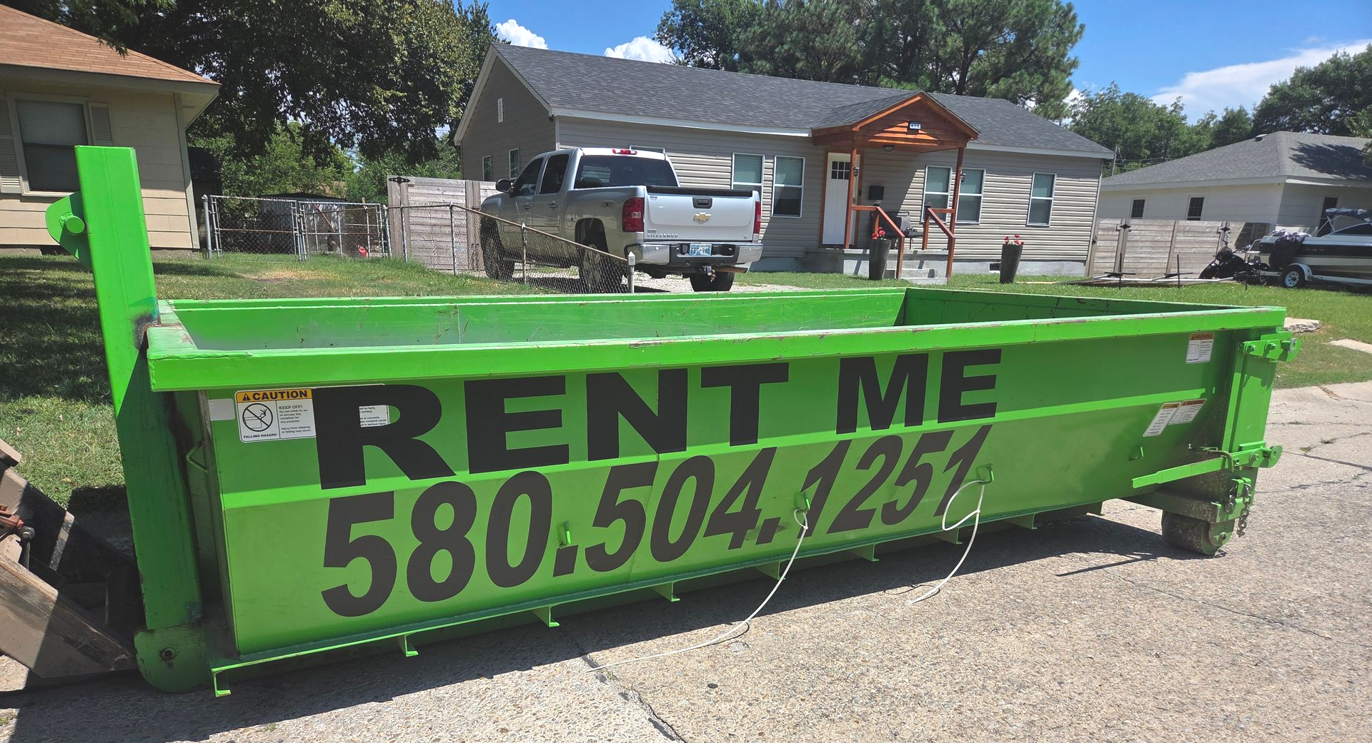 Green dumpster with
