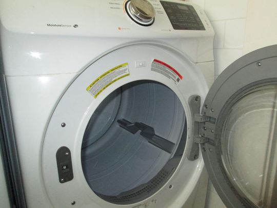 open dryer machine door
