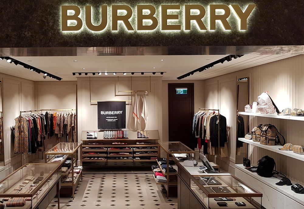A Burberry Store with a Lot of Clothes on Display — Cairns Excel Electrics In Bungalow, QLD
