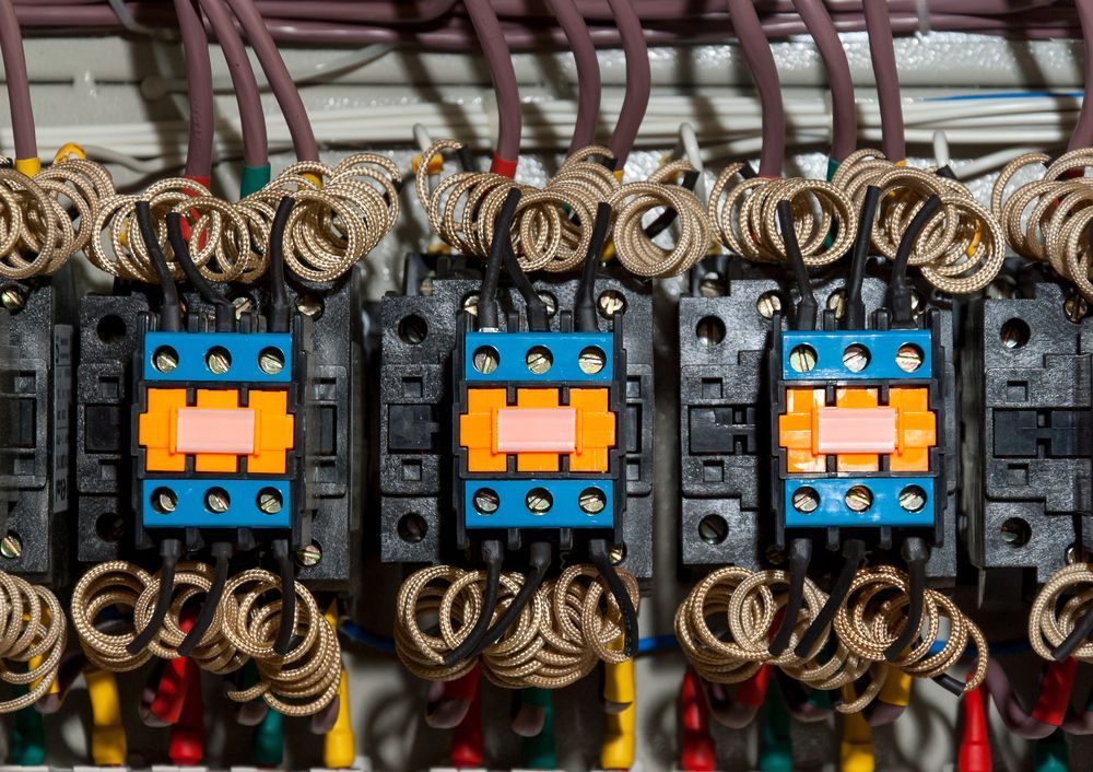 Electrical Control Panel With Three Blue and Orange Relay Modules — Cairns Excel Electrics In Cairns City, QLD