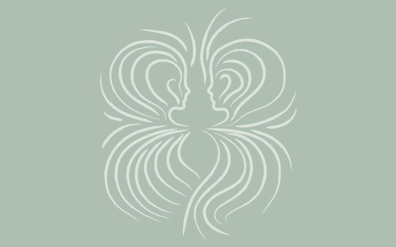 A drawing of two faces surrounded by swirls on a green background.