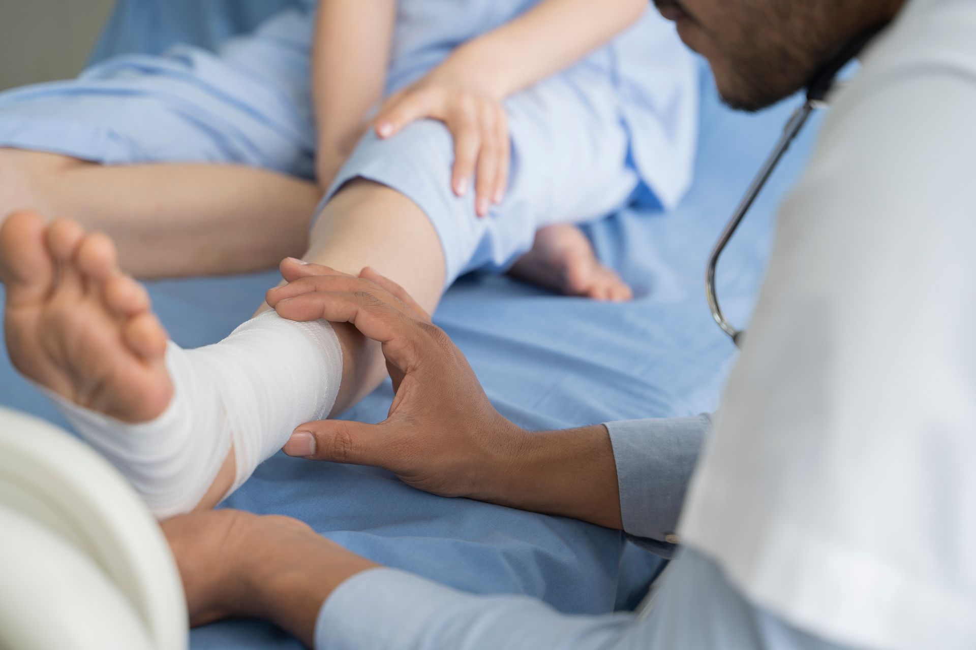 Doctor Examining the Symptoms of a Patient’s Feet | St. Augustine, FL - Wells Surgical Services LLC