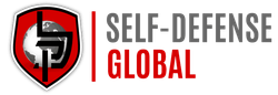 Self-Defense Global logo with red shield icon and black text on white background