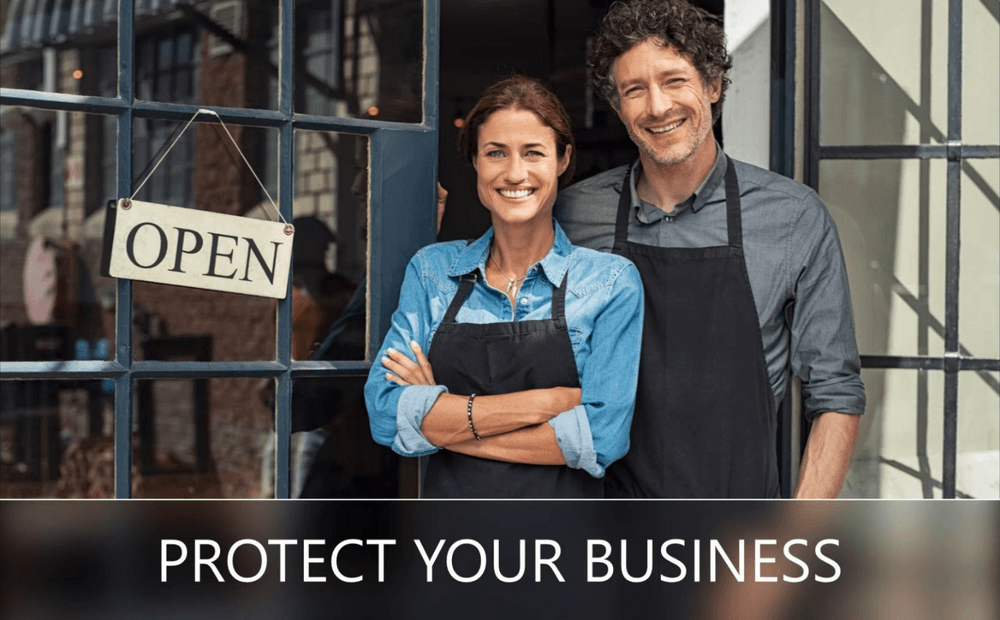A man and a woman are standing in front of an open sign.