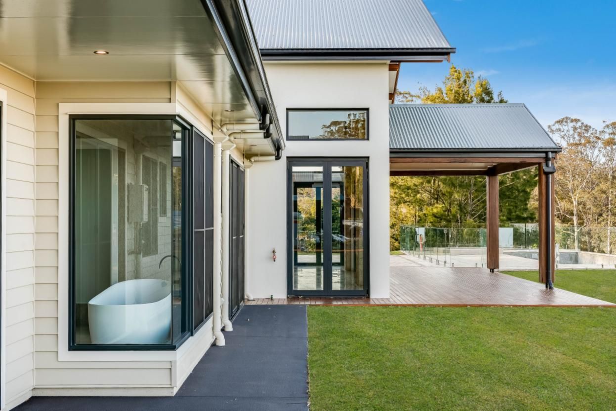 A White House With a Bathtub — Windamere Homes in Highfields, QLD