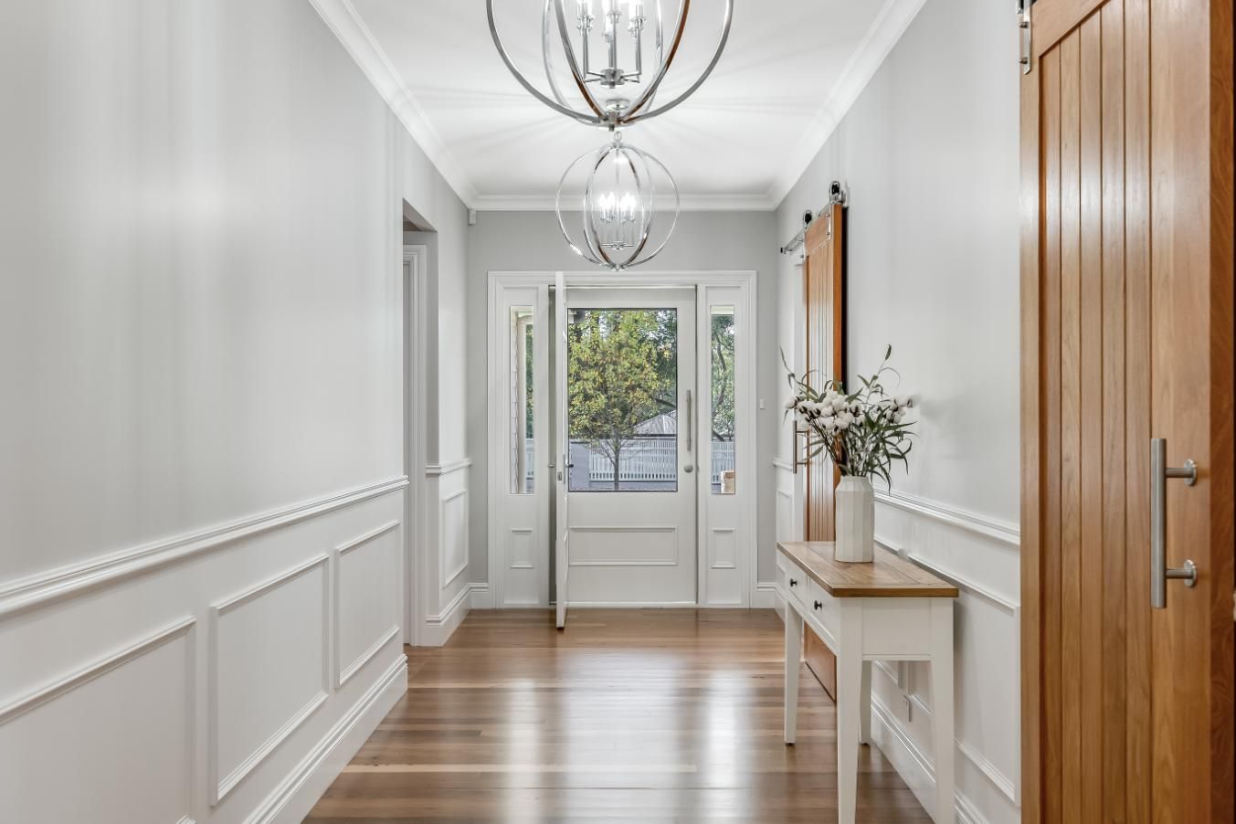 A Hallway in a House With a Table — Windamere Homes in Highfields, QLD