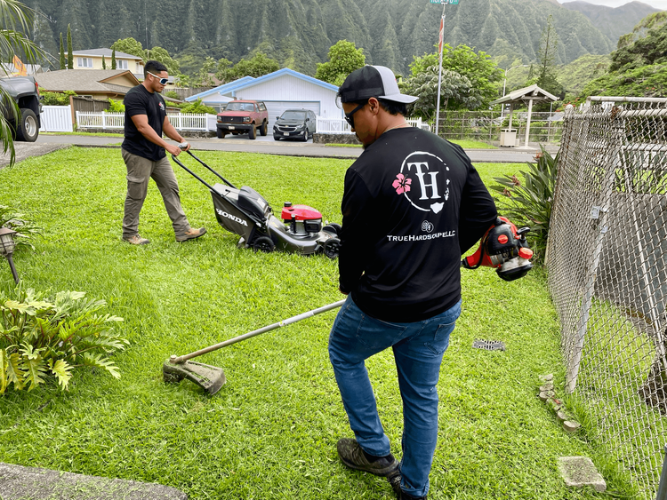 true hardscape founder dallas works with his crew on a custom hardscape design