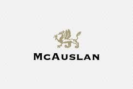 Un logo pour une entreprise appelée mcauslan avec un lion sur fond blanc.