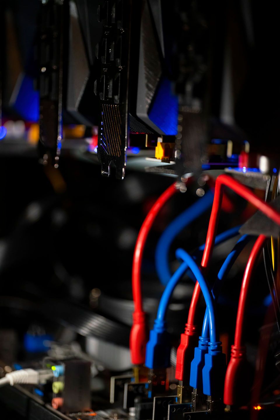 A bunch of wires are connected to a computer motherboard