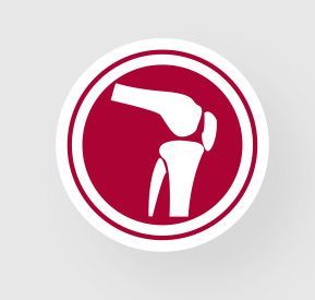 Red circular sign with a white human figure bending forward and a raised arm