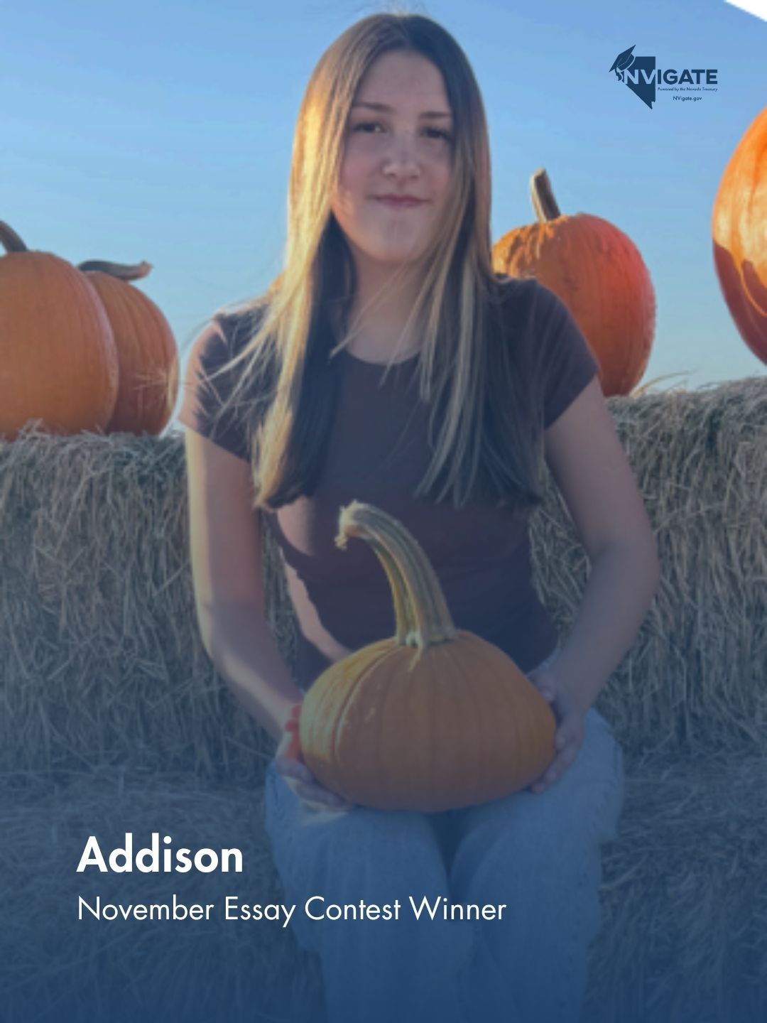 Woman holding a pumpkin in a pumpkin patch with hay bales and pumpkins; text reads “Addison, November Essay Contest Winner.”