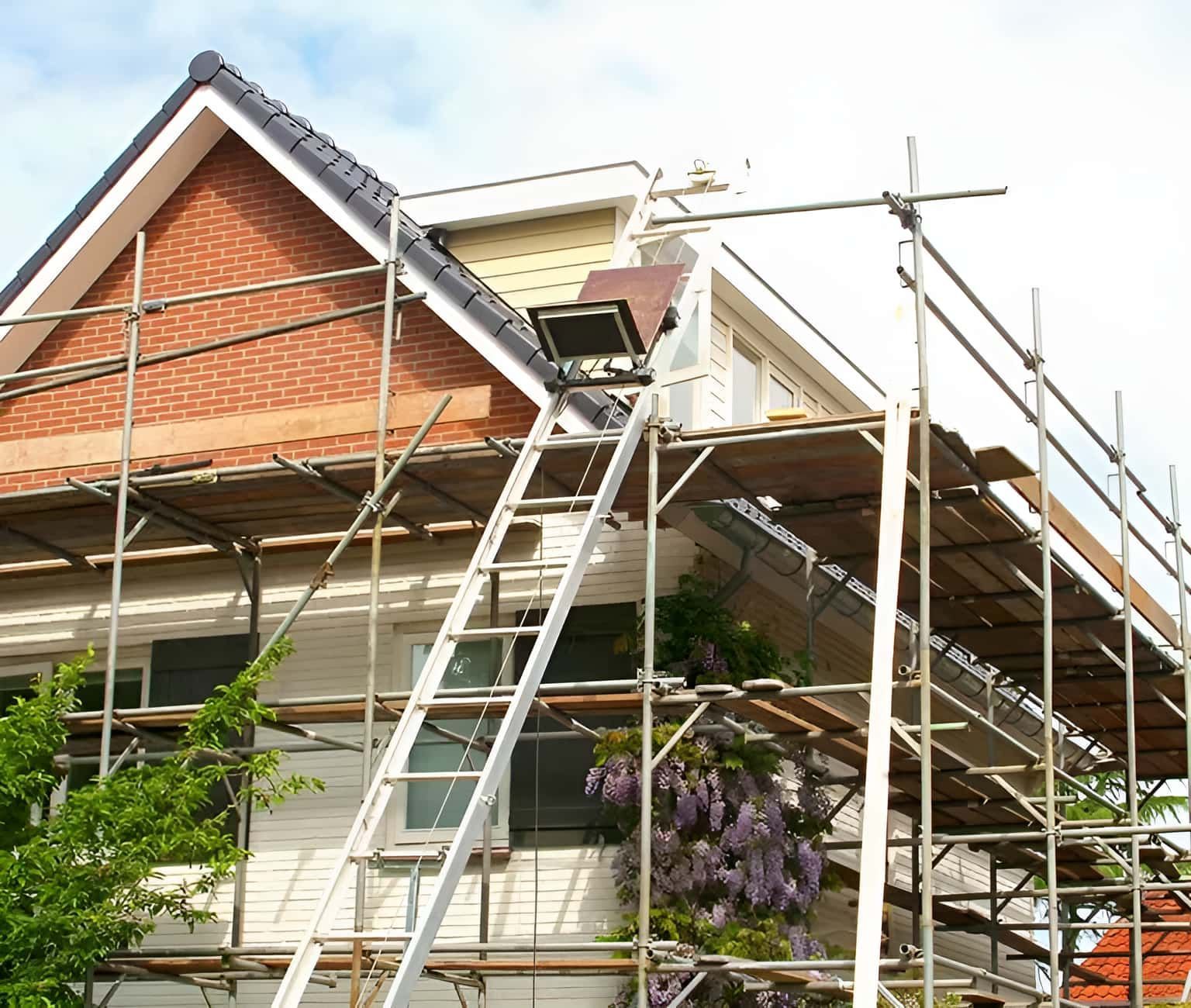 A House With Scaffolding Around It And A Ladder On Top Of It — Andrew Logan Building In Dubbo, NSW