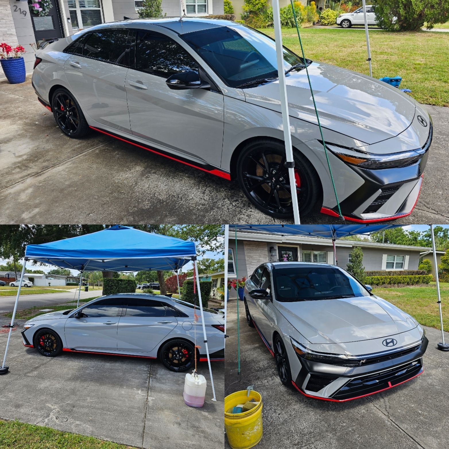 Silver Honda Civic with black/red accents parked in a driveway under a blue canopy.