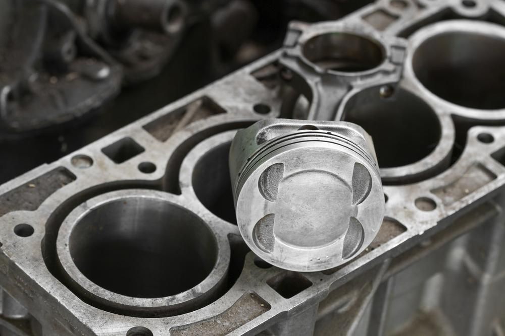 A Close Up Of A Piston On Top Of A Cylinder Block — Torque Tech Supply & Repairs In Port Macquarie, NSW