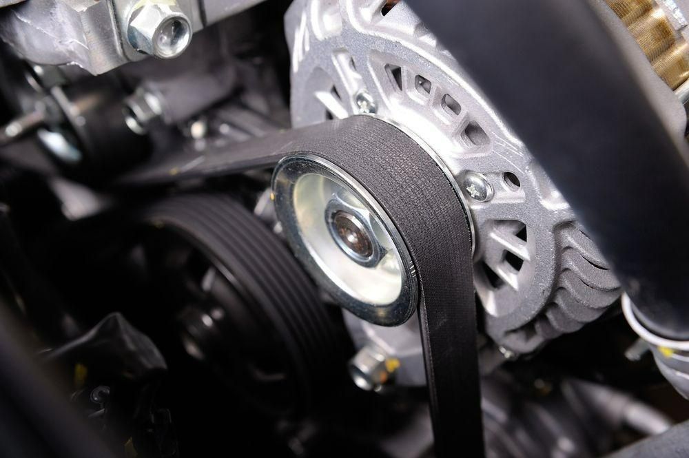 A Close Up Of A Belt On A Car Engine — Torque Tech Supply & Repairs In Port Macquarie, NSW