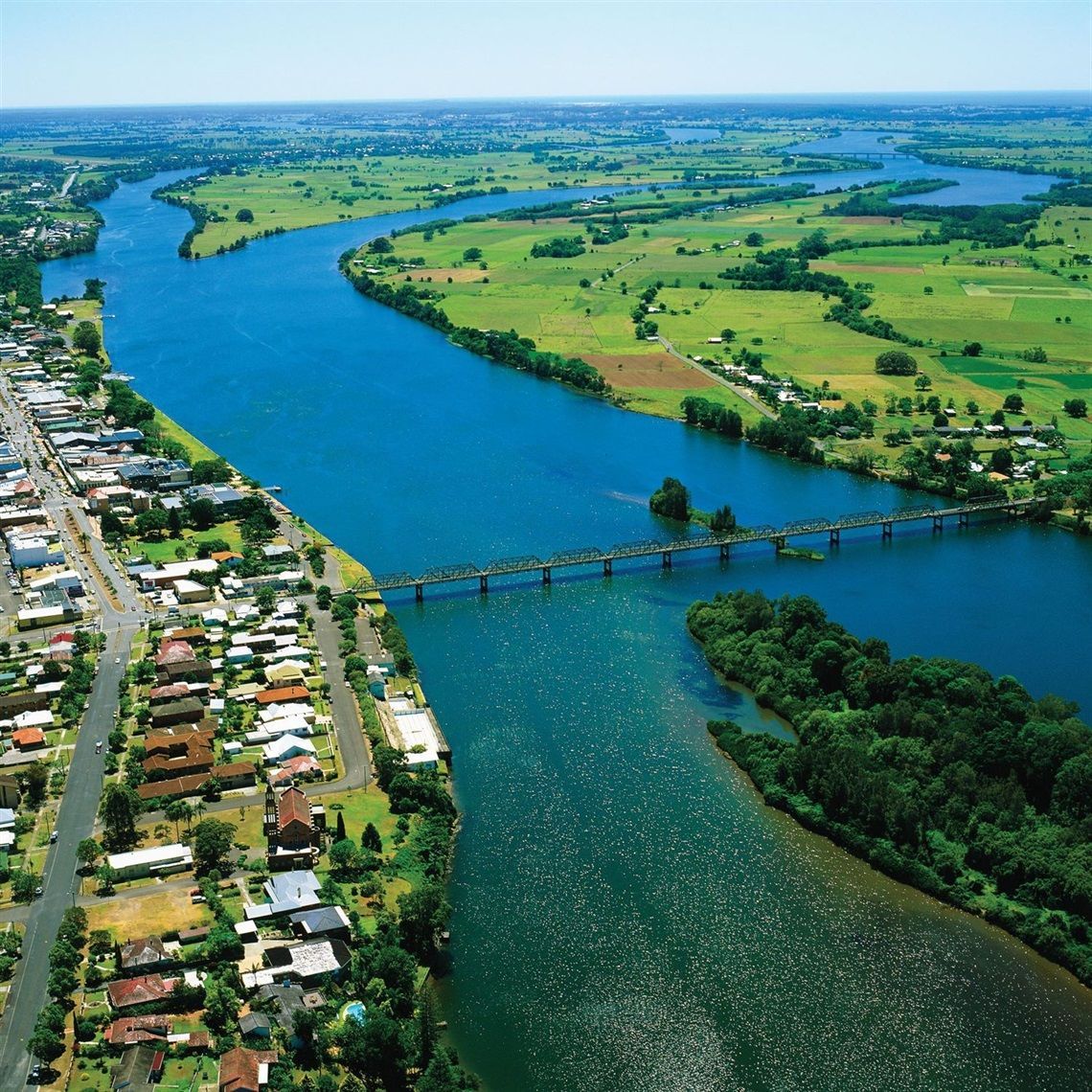 An aerial view of a bridge over a river — Torque Tech Supply & Repairs In Taree, NSW