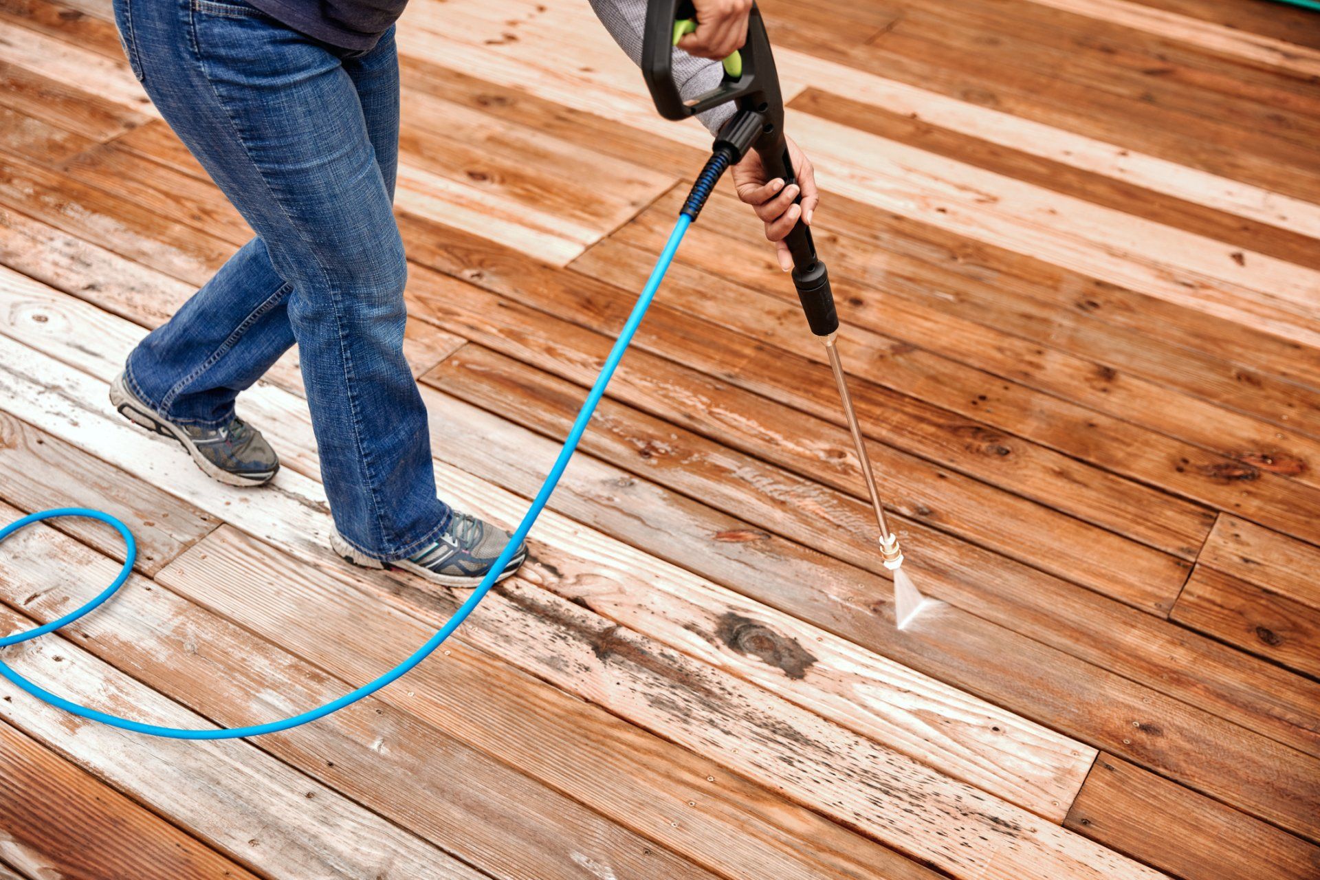Pressure Washer Cleaning a Weathered Deck - Savannah, GA - Squeaky Clean Pressure Washer Cleaning a Weathered Deck - Savannah, GA - Squeaky Clean